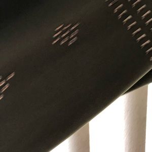 Green long sleeved blouse with bronze accents